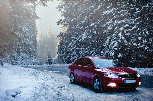 Car driving in snow